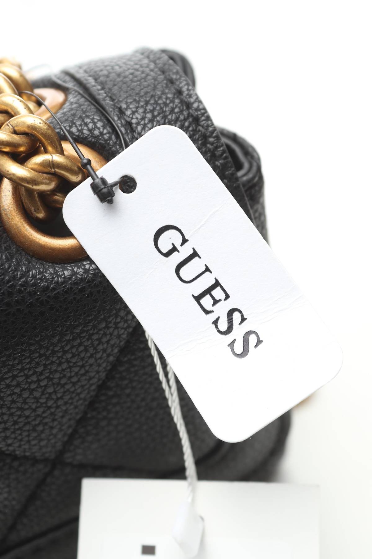 Дамска кожена чанта Guess4