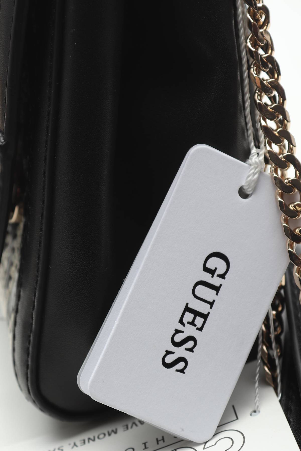 Дамска кожена чанта Guess4