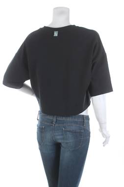 Дамска спортна тениска Puma2