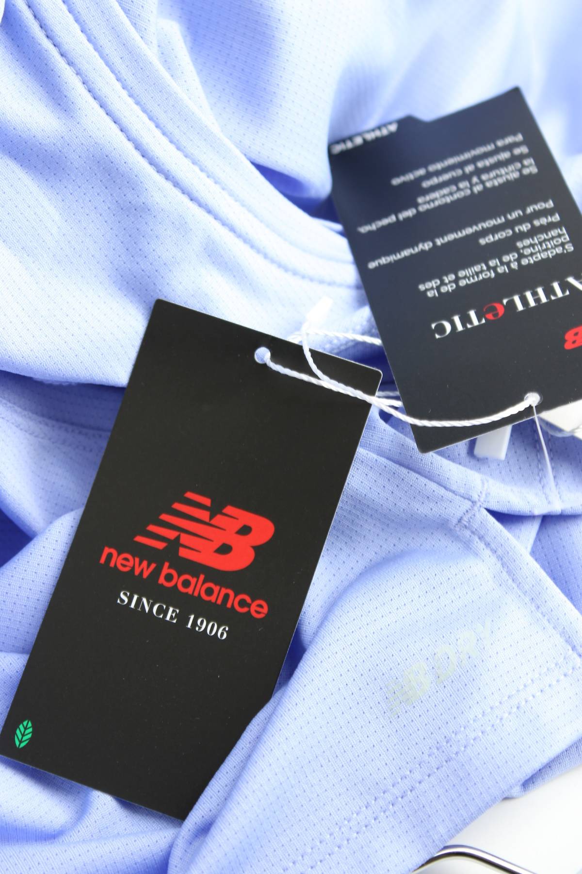 Γυνικείο αθλητικό αμάνικο New Balance3