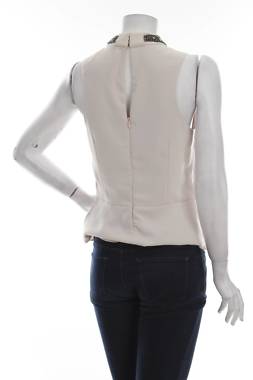Γυναικείο αμάνικο Guess2