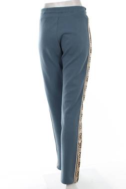 Γυναικείο αθλητικό παντελόνι Guess2 - Contourshop.gr Γυναικείο αθλητικό παντελόνι Guess2