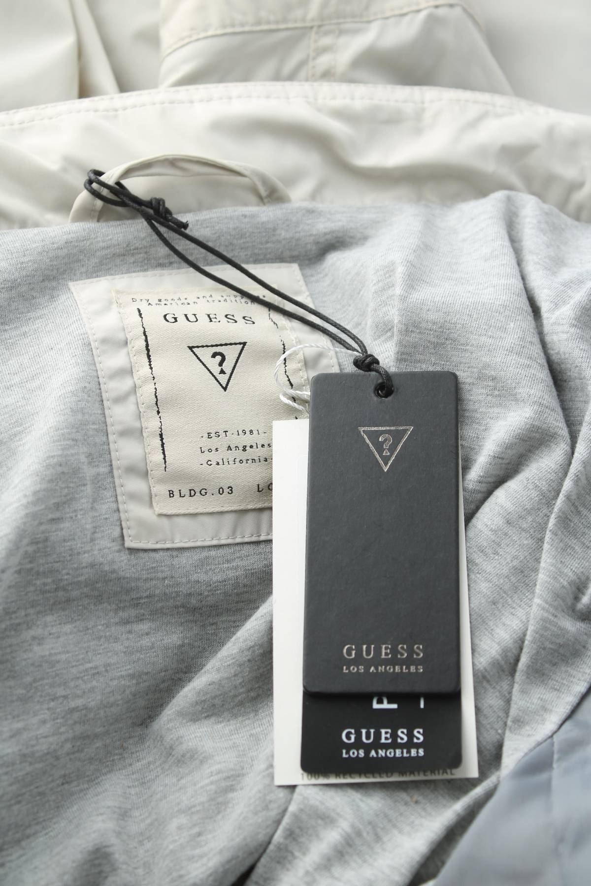 Ανδρικό μπουφάν Guess4