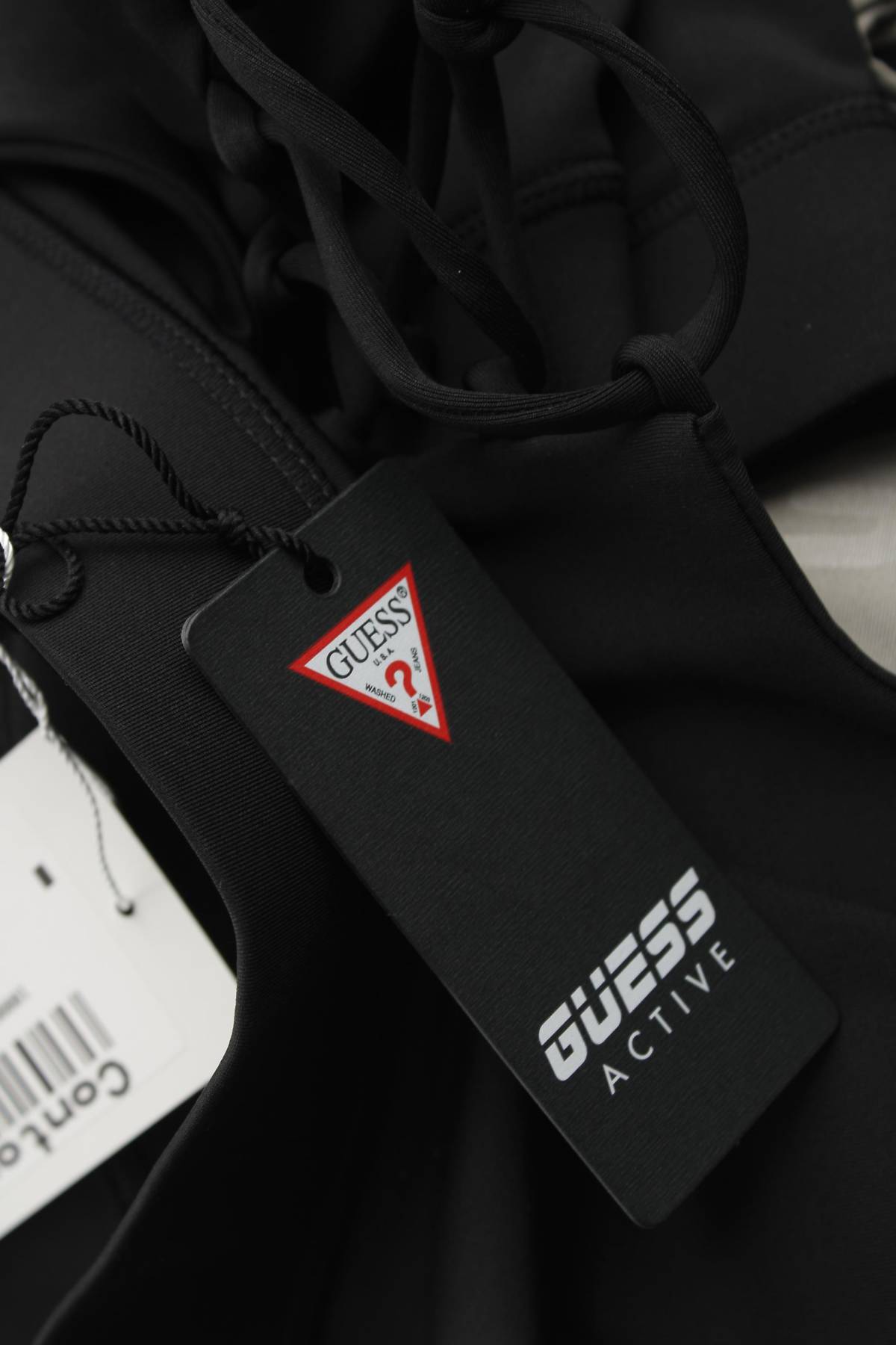Γυνικείο αθλητικό αμάνικο Guess3 - Contourshop.gr Γυνικείο αθλητικό αμάνικο Guess3