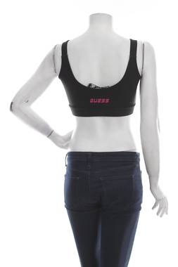 Γυνικείο αθλητικό αμάνικο Guess2 - Contourshop.gr Γυνικείο αθλητικό αμάνικο Guess2