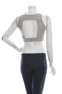 Γυνικείο αθλητικό αμάνικο Guess2 - Contourshop.gr Γυνικείο αθλητικό αμάνικο Guess2